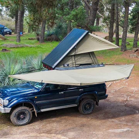Land Cruiser with a rooftop tent and the 180 XT MAX Awning open