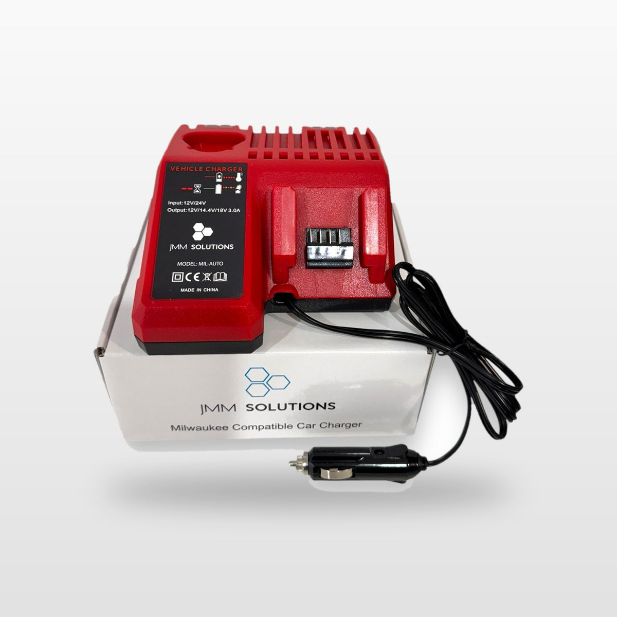 Milwaukee-compatible Balanced Auto Charger: charger standing on its box