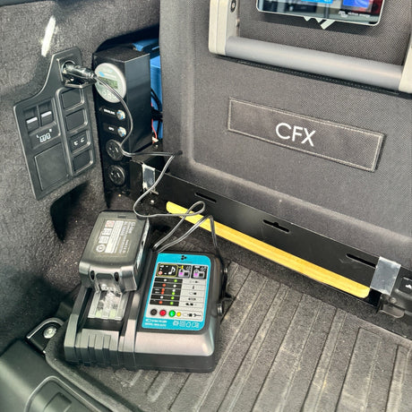 Makita-compatible Balanced Auto Charger: mounted in a vehicle's rear cargo area