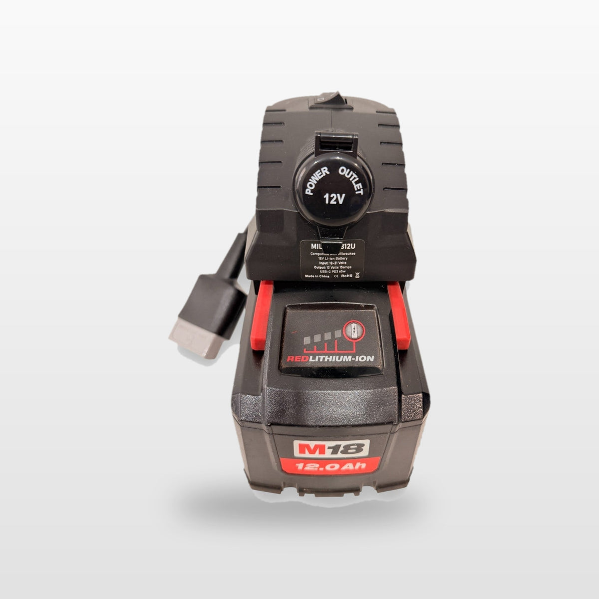 Milwaukee-compatible Volt Step Down PRO: front view showing the capped 12V socket