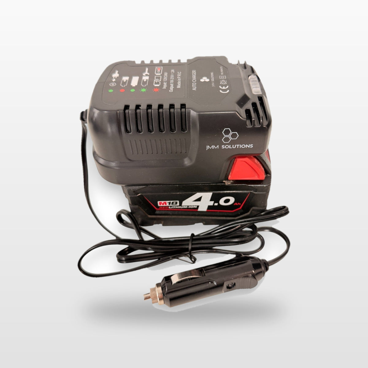 Milwaukee-compatible Auto Charger: angled view of the charger with battery and 12V lead
