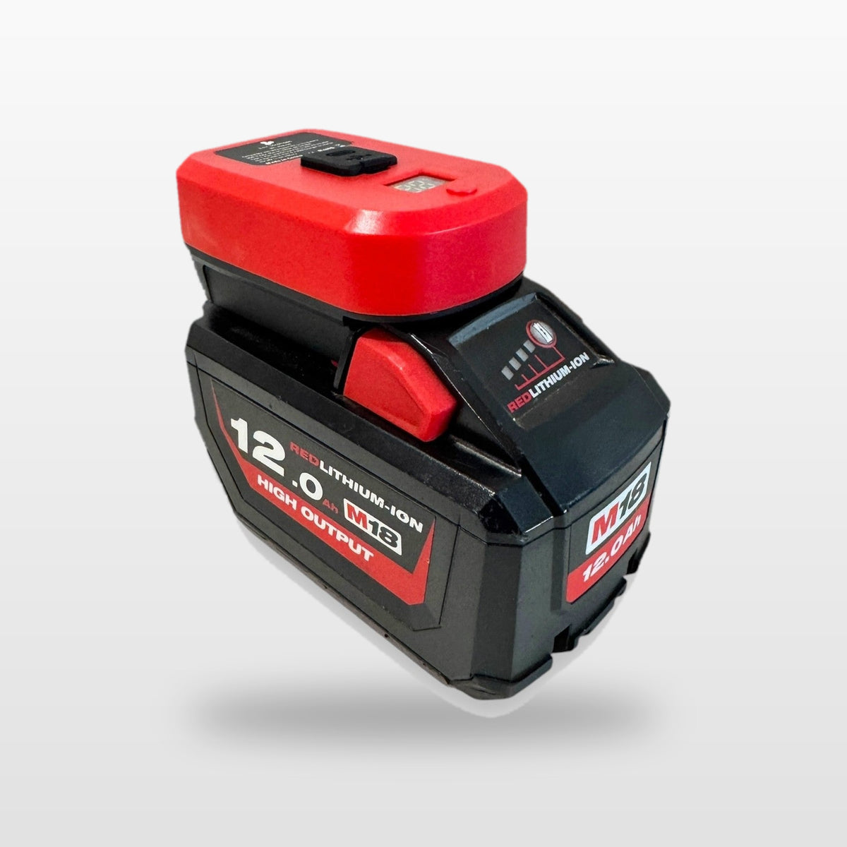Milwaukee-compatible USB-C 65W PD Charger: adaptor on an 18V battery, angled view