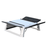Xtreme canopy with a white frame, glass side doors open