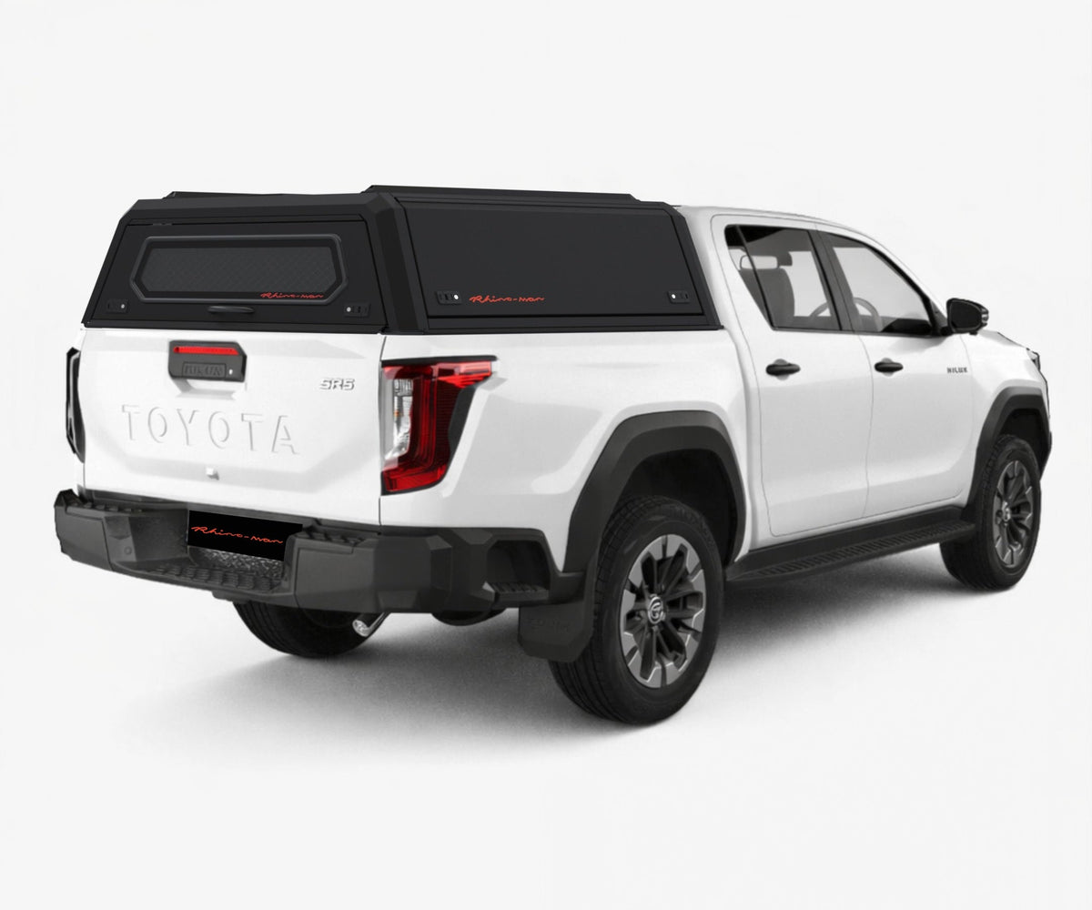 Toyota Hilux Travo dual cab with a black LX canopy