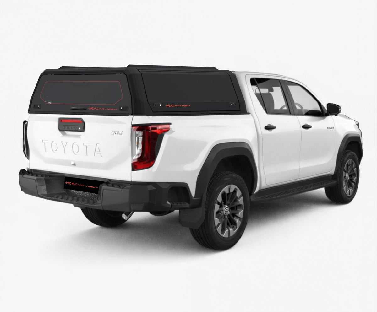 Toyota Hilux Travo dual cab with a black Xpedition canopy