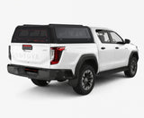 Toyota Hilux Travo dual cab with a black Xtreme canopy